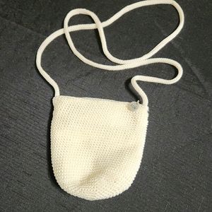 The Sak cream colored knit mini crossbody bag